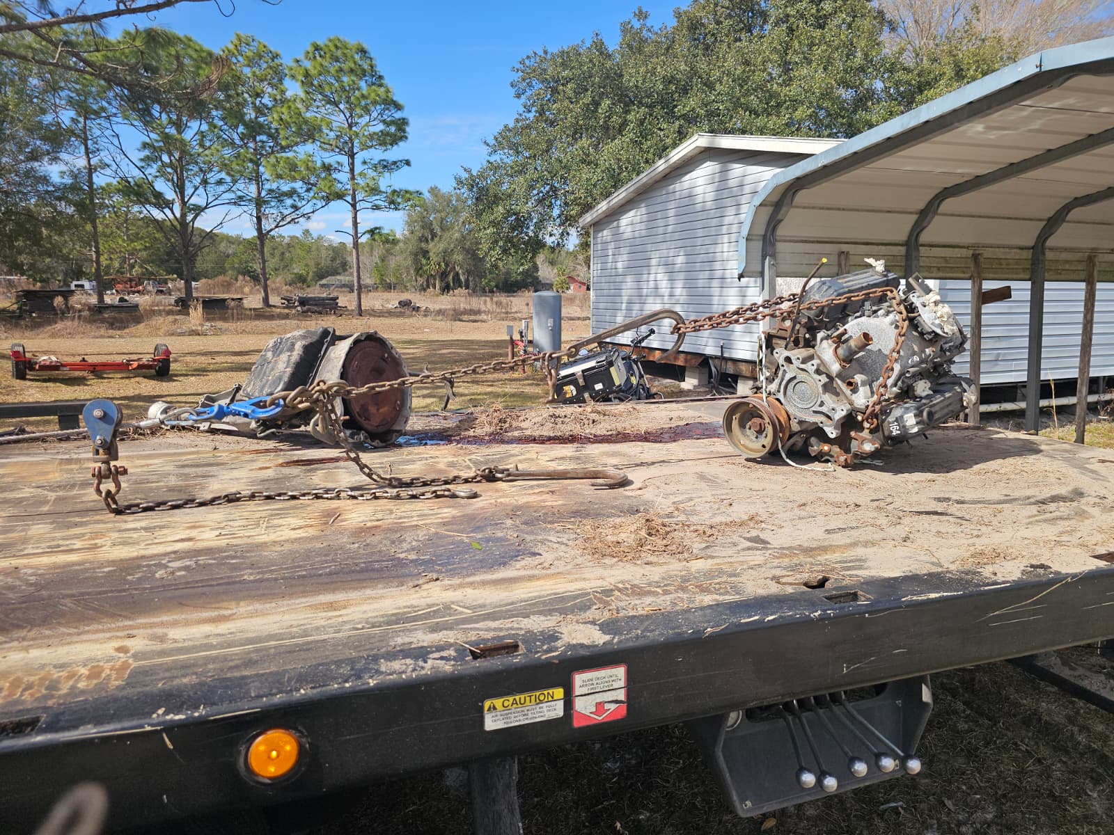 junk car removal for cash hauling scrap engine parts in Central Florida
